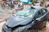 Udupi: Tempo turtles upon Car, driver escaped miraculously
